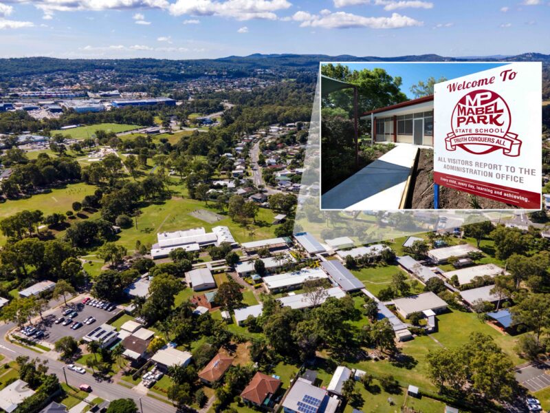 Aerial drone view over Mabel Park State School campus and surrounding Logan suburbs with an inset of the school welcome sign.