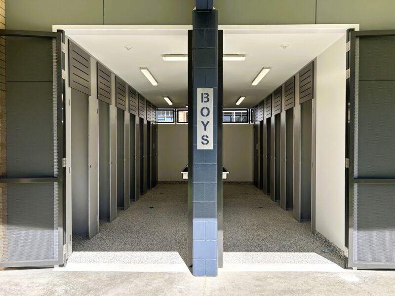 Boys amenities block entry with a navy 